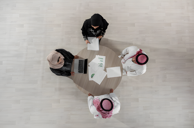 Professional team meeting around a table
